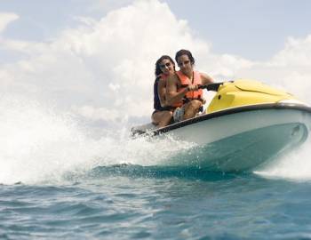 couple on jet skis